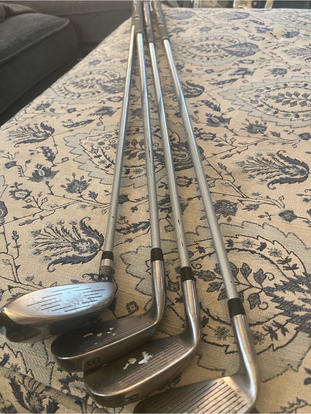 Top-Flite Majesty wood and several irons/wedges labeled with "S", "P", and "7"